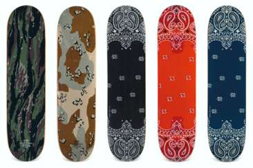 A COLLECTION OF VINTAGE CAMO & PAISLEY SKATEBOARDS