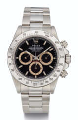 ROLEX, STEEL CHRONOGRAPH, REF. 16520 WITH TROPICAL CHAPTER RINGS 