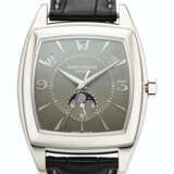 Patek Philippe. PATEK PHILIPPE, 18K WHITE GOLD, ANNUAL CALENDAR WRISTWATCH WITH MOON PHASES, REF. 5135G - фото 1