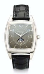 PATEK PHILIPPE, 18K WHITE GOLD, ANNUAL CALENDAR WRISTWATCH WITH MOON PHASES, REF. 5135G