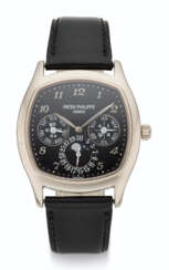 PATEK PHILIPPE, 18K WHITE GOLD, PERPETUAL CALENDAR WITH 24 HOUR INDICATION AND MOON PHASES, REF. 5940G-010
