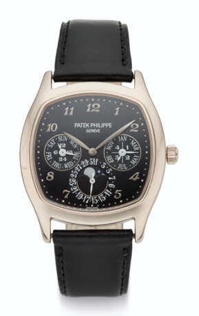 Patek Philippe. PATEK PHILIPPE, 18K WHITE GOLD, PERPETUAL CALENDAR WITH 24 HOUR INDICATION AND MOON PHASES, REF. 5940G-010 - photo 1