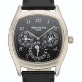 Patek Philippe. PATEK PHILIPPE, 18K WHITE GOLD, PERPETUAL CALENDAR WITH 24 HOUR INDICATION AND MOON PHASES, REF. 5940G-010 - фото 1