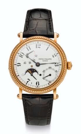Patek Philippe. PATEK PHILIPPE, 18K GOLD, POWER RESERVE AND MOON PHASES, REF. 5015J - фото 1