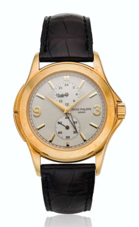 Patek Philippe. PATEK PHILIPPE, 18K GOLD DUAL-TIME WRISTWATCH WITH 24-HOUR INDICATION AND TWO-TONE DIAL, REF. 5134 - Foto 1