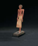 Mittleres Reich. AN EGYPTIAN POLYCHROME WOOD FIGURE OF AN OFFICIAL