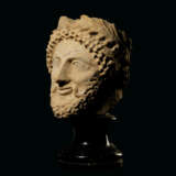 A CYPRIOT LIMESTONE HEAD OF A MALE VOTARY - photo 1