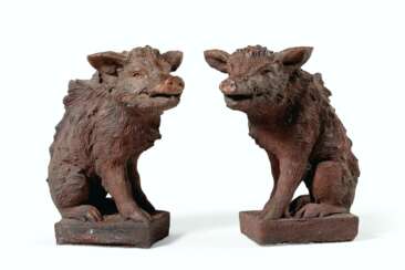 A PAIR OF TERRACOTTA FIGURES OF BOARS