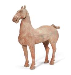 A LARGE PAINTED POTTERY FIGURE OF A HORSE