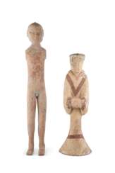 TWO PAINTED POTTERY FIGURES OF A MAN AND A LADY