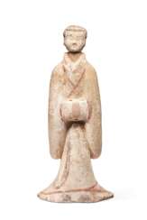 A LARGE PAINTED POTTERY FIGURE OF AN ATTENDANT 