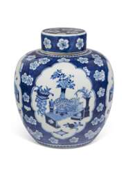 A BLUE AND WHITE JAR AND A COVER