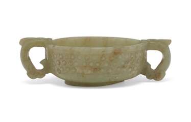 A GREENISH-WHITE JADE TWO-HANDLED CUP