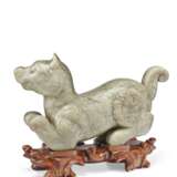 A GREYISH-GREEN CARVED JADE FIGURE OF A DOG - photo 1