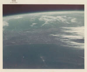 First human-taken photograph from space; Earth horizon over Florida and Cape Canaveral, February 20, 1962