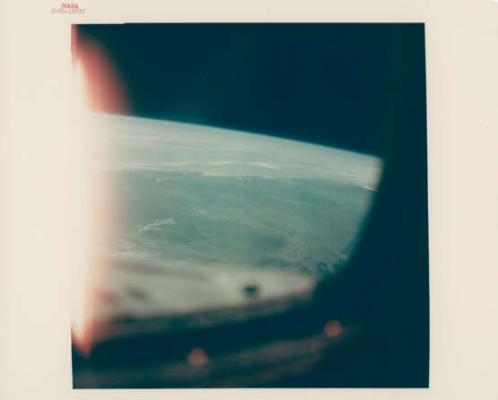 First photograph from space taken during the Gemini program; Earth seen through the spacecraft’s window, March 23, 1965 - photo 1