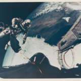 First US Spacewalk: views of Ed White returning to the spacecraft at the end of the EVA, June 3-7, 1965 - фото 1
