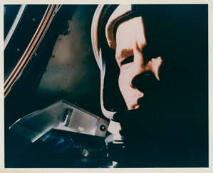Ed White in weightlessness in the pilot’s seat of the capsule, the first in-flight portrait of an astronaut, June 3-7, 1965