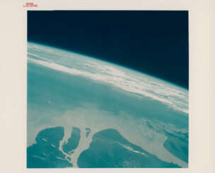 Views of Earth from space: horizon over China and Yangtze River; Baja California; light-struck shot over India; Japan; Tibet; Africa, August 21-29, 1965
