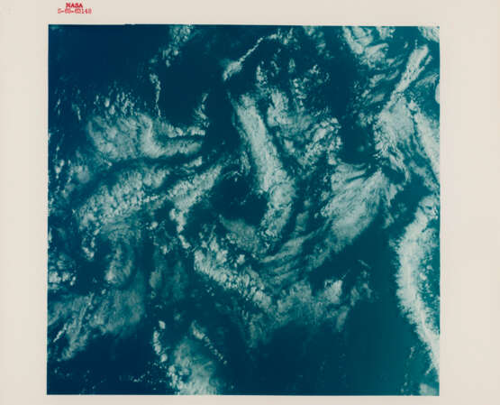 Views of Earth from space: Somali; cloud vortex; desert sand dunes; horizon over Mali; congratulations at Mission Control; recovery ship USS WASP, December 15-16, 1965 - photo 1