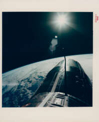 EVA photograph: Sun, Earth, Gemini spacecraft and black sky of space; the Angry Alligator above the Earth horizon, June 3-6, 1966