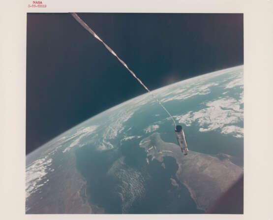 Views of Agena tethered to Gemini XII over the Earth horizon; over Houston and the Texas Gulf coast, November 11-15, 1966 - photo 1