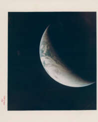 First color photograph of the whole Planet Earth; first color photograph of Earth taken beyond low orbit, November 9, 1967