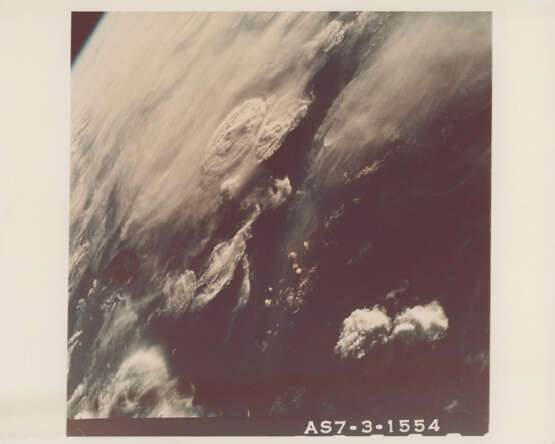 The expended Saturn SIVB stage over the Earth; views of Earth from space: Sunset; horizon over Los Angeles; Cape Kennedy, October 11-22, 1968 - photo 3