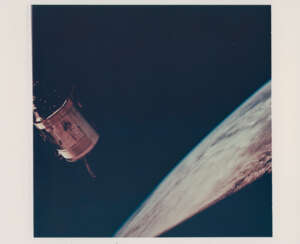 The CM Gumdrop over the Earth horizon and against the black sky of space; the LM Spider over the Earth, March 3-13, 1969