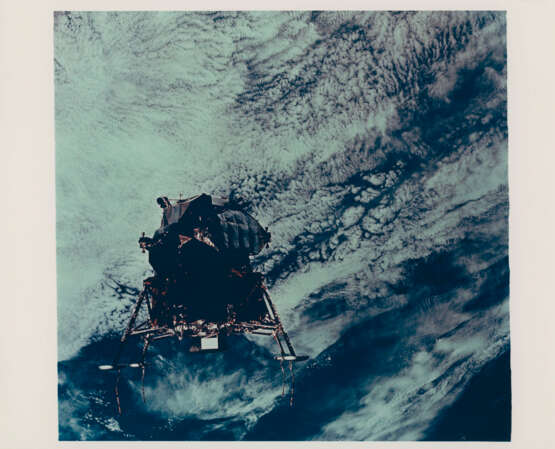 The CM Gumdrop over the Earth horizon and against the black sky of space; the LM Spider over the Earth, March 3-13, 1969 - photo 5