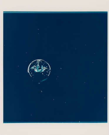 The Planet Earth; the LM Snoopy during the first translunar docking; half of the Earth appearing through the window, May 18-26, 1969 - photo 3