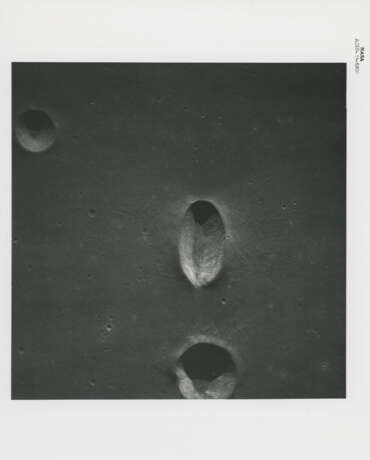 Farside and nearside moonscapes encountered during the first orbits including twin craters; spacecraft exterior, May 18-26, 1969 - photo 1