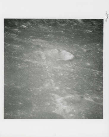 Farside and nearside moonscapes encountered during the first orbits including twin craters; spacecraft exterior, May 18-26, 1969 - photo 21