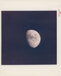 The whole Moon from the equal potential point between the Earth and the Moon; three quarters of the full Moon, May 18-26, 1969