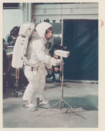 Views of Neil Armstrong examining his Hasselblad camera and simulating the deployment of the lunar surface TV camera, April-June 1969 - photo 3