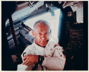 Buzz Aldrin weightless inside Eagle; right side of LM cabin with 16mm camera; the hatch of the CM Columbia, July 16-24, 1969