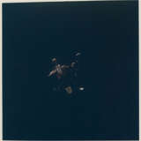 Eagle beginning its descent to the lunar surface; Columbia over the eastern Sea of Tranquility, July 16-24, 1969 - photo 1