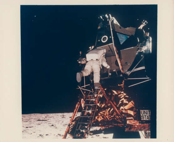 Buzz Aldrin climbing down the ladder of the LM Eagle, July 16-24, 1969 - photo 1