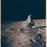 Buzz Aldrin setting up the lunar science station; Aldrin exploring the Sea of Tranquility; Aldrin adjusting the seismometer, July 16-24, 1969 - photo 6