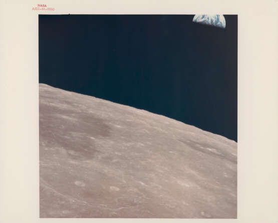Earthrise, taken after transEarth injection, July 16-24, 1969 - photo 1
