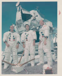 Portrait of the crew; the mission insignia; lunar surface training and prelaunch activities, Apollo 12; Mariner 6 and 7 photographs of Mars, July-November 1969