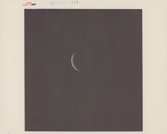 Slender crescent Moon and crescent Earth seen during translunar coast, November 14-24, 1969 - photo 1