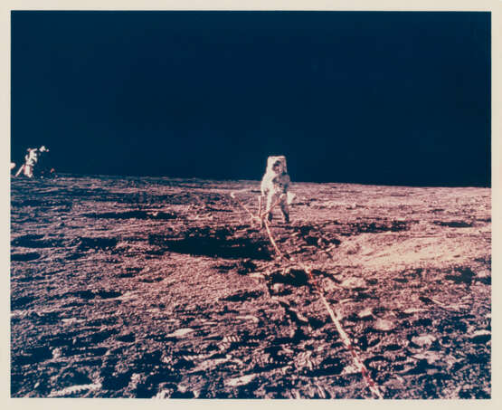 Views of Pete Conrad at the lunar-science station, the Passive Seismic Experiment; Alan Bean with the LM in the background, November 14-24, 1969, EVA 1 - photo 5