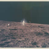Bluish halo around Alan Bean; details of the lunarscape at the lunar-science station; Pete Conrad collecting a sample; fresh lunar soil, November 14-24, 1969, EVA 1 - photo 1