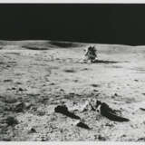 Alan Shepard back to the LM Antares; moonscapes at station G; Shepard and shadows at station G1; moonscape at station H, January 31-February 9, 1971, EVA 2 - Foto 1