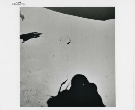 James Irwin climbing toward the Rover; human footprint; astronauts’ shadows; David Scott preparing to take a photograph, station 6, July 26-August 7, 1971, EVA 2 - photo 6
