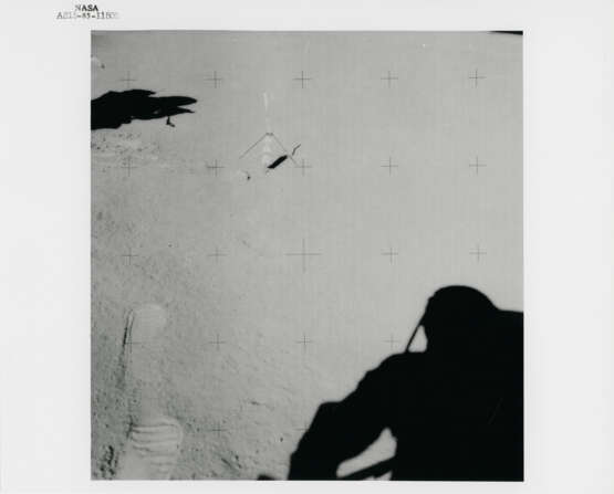 James Irwin climbing toward the Rover; human footprint; astronauts’ shadows; David Scott preparing to take a photograph, station 6, July 26-August 7, 1971, EVA 2 - фото 8