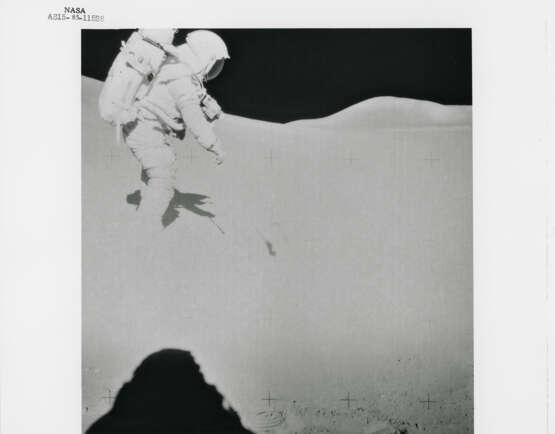 James Irwin climbing toward the Rover; human footprint; astronauts’ shadows; David Scott preparing to take a photograph, station 6, July 26-August 7, 1971, EVA 2 - фото 10
