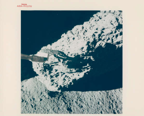 Views of David Scott during geological investigations; TV picture, station 7; the lunar tongs set against a big boulder, station 4, July 26-August 7, 1971, EVA 2 - фото 8