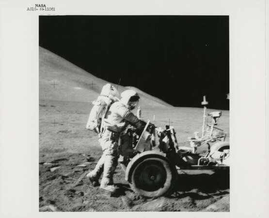 Views at the lunar-science station: David Scott at the Rover; human tracks; a photograph and other “souvenirs” left on the Moon; Hadley Base, July 26-August 7, 1971, EVA 3 - фото 1